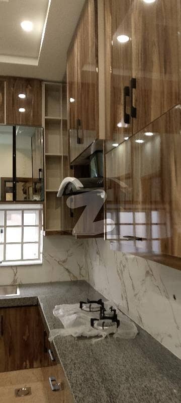 10 Marla Brand New Triple Story In UMER block Iqbal Town Lahore